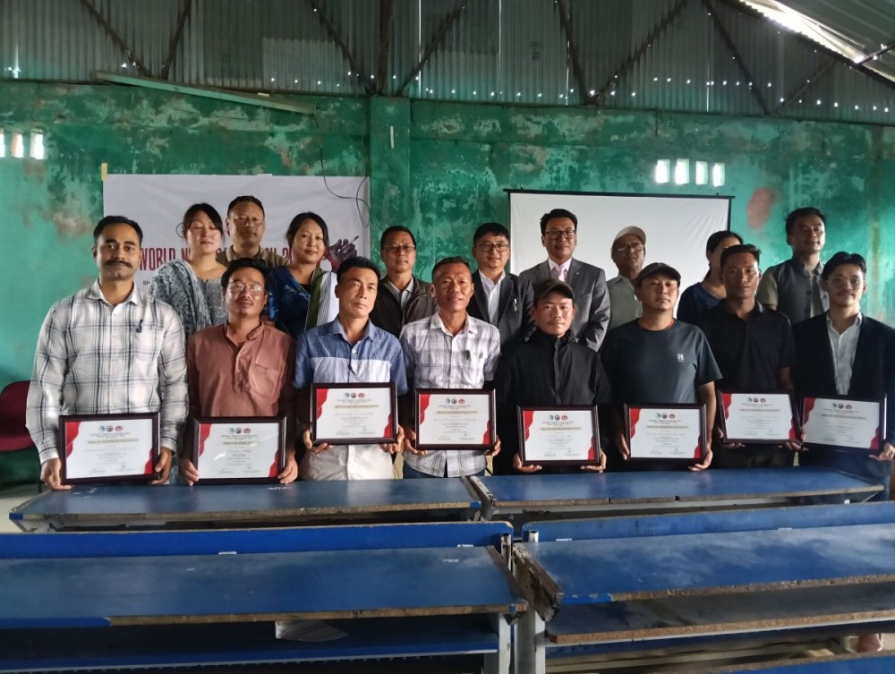 Deputy Commissioner Rhosietho Nguori with awardees and dignitaries during the World No Tobacco Day programme at GHSS Phek.